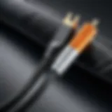 Close-up of a heavy-duty aux cord highlighting durability features.
