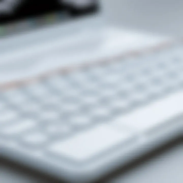 Elegant Keyboard and User Interface Close-up of a white laptop keyboard