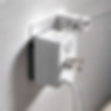 Close-up of an LG travel adapter plugged into a wall outlet in an international setting