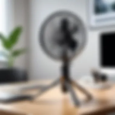 Opolar tripod fan positioned in an office workspace