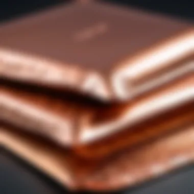 Eco-friendly packaging materials alongside rose gold mailers