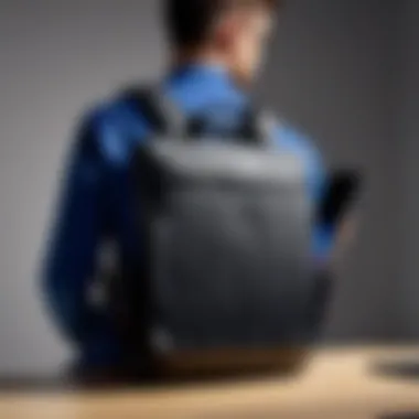 User utilizing the Samsung Galaxy Book Bag in a professional setting.