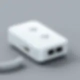 Close-up of a wireless landline adapter showcasing its sleek design and connectivity ports.